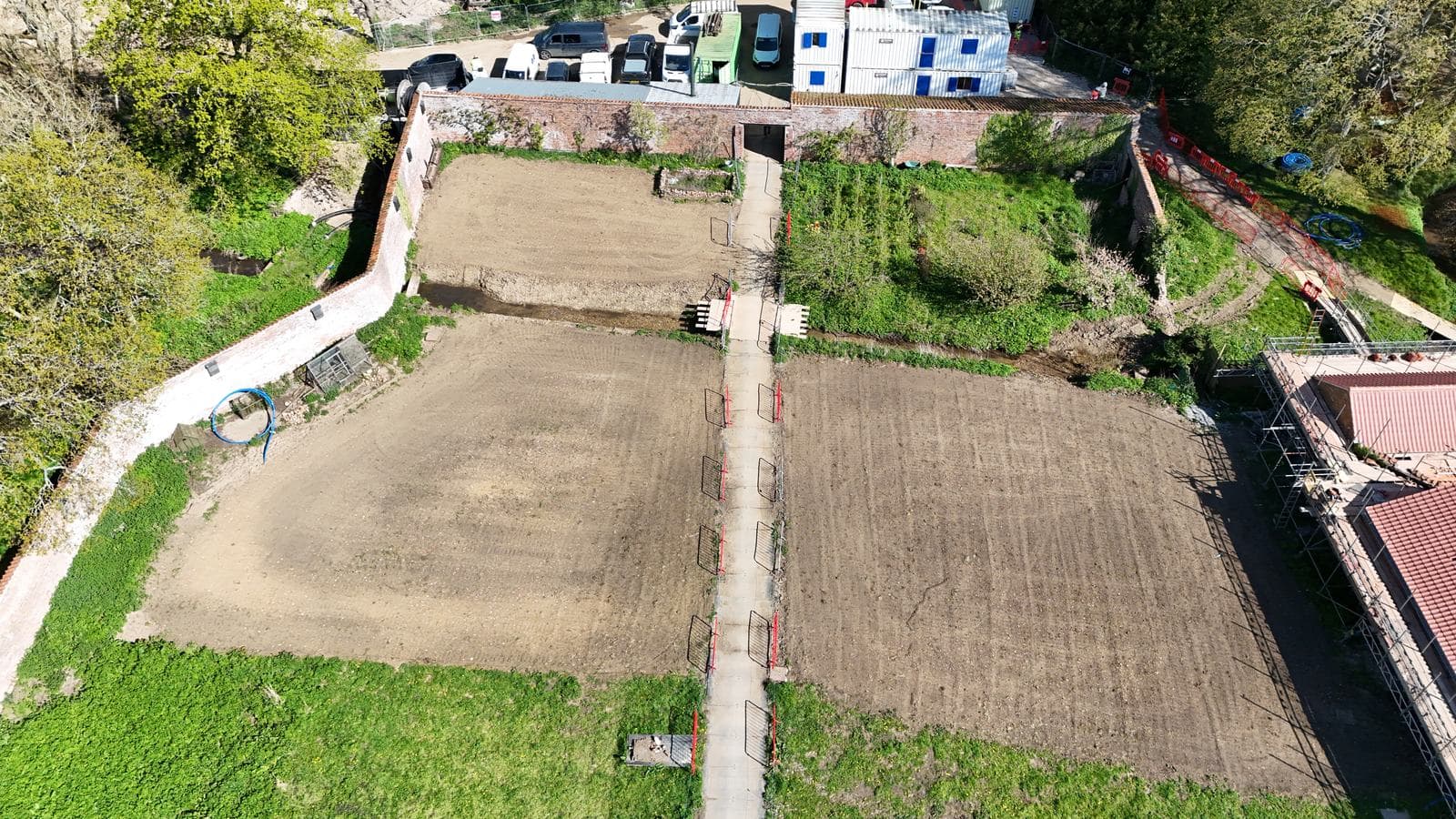 Drone plan view of the walled garden with graded plots set out