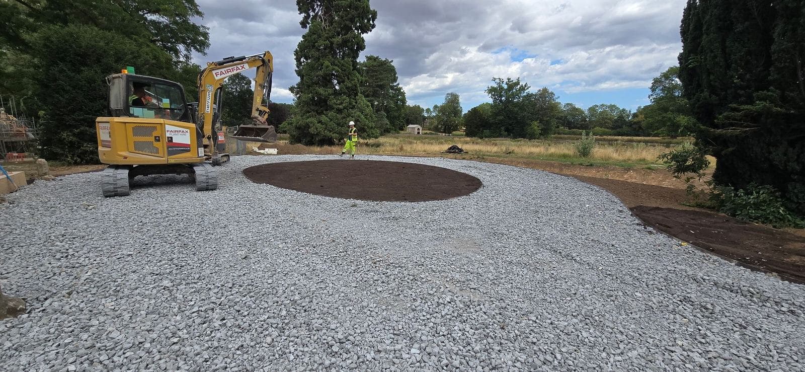 Completed circular stone hardstanding in mature parkland