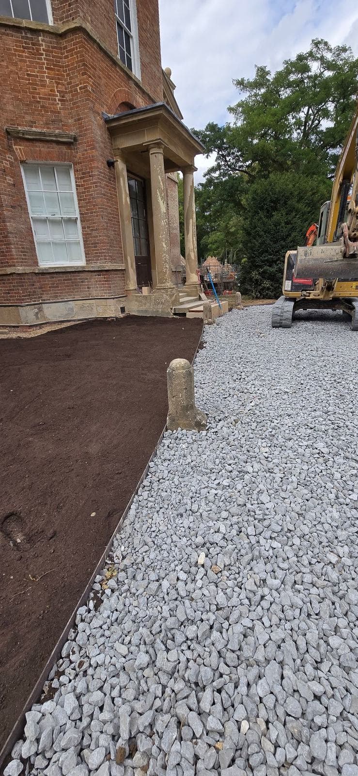 Completed groundworks outside the Georgian hall and its stone portico