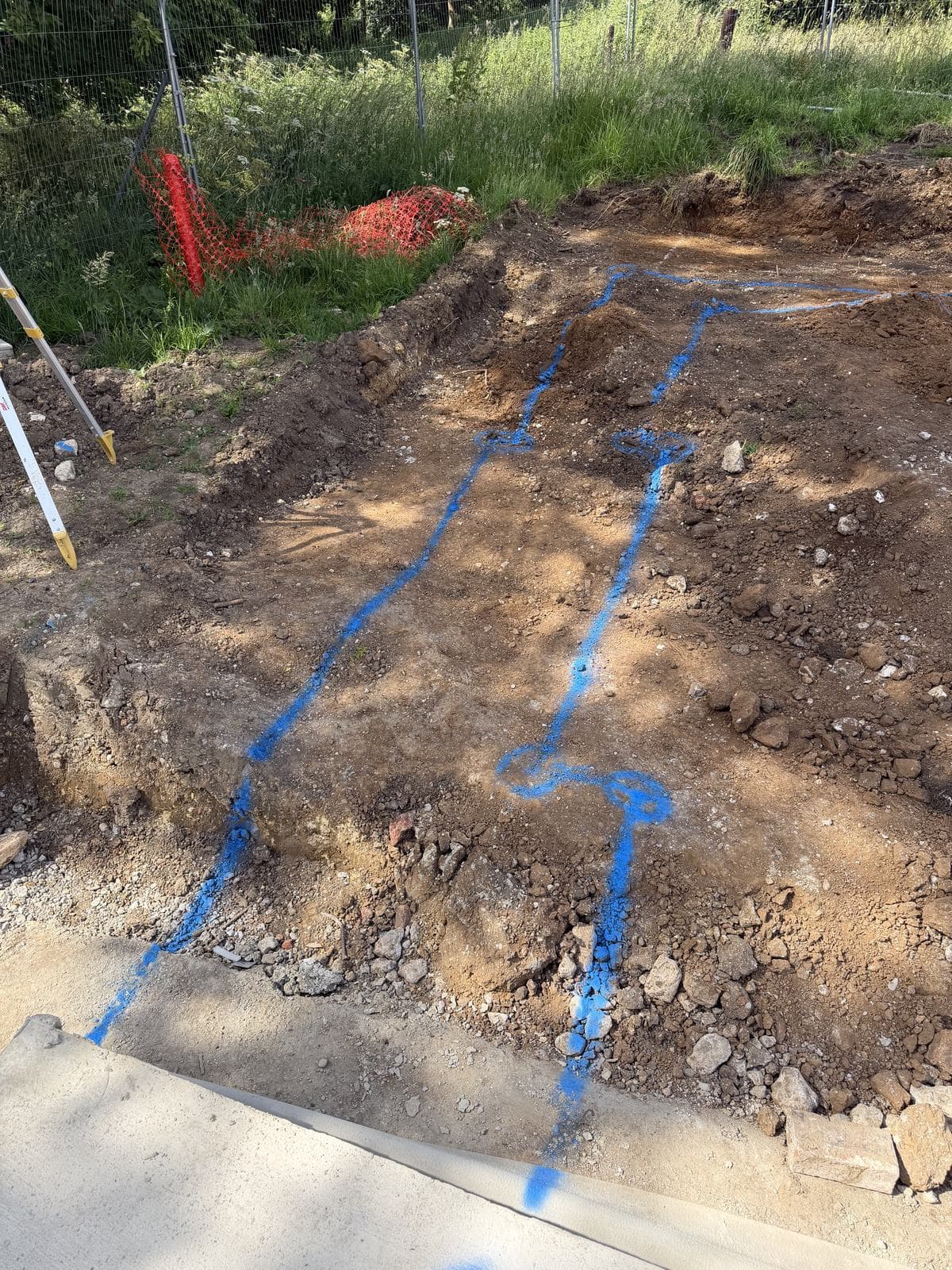 Service routes marked out in blue on the excavated formation