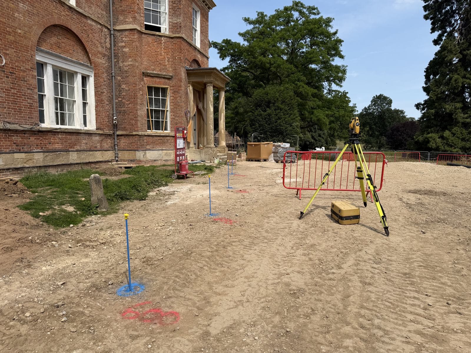 Total station set up for setting out in front of the Georgian hall